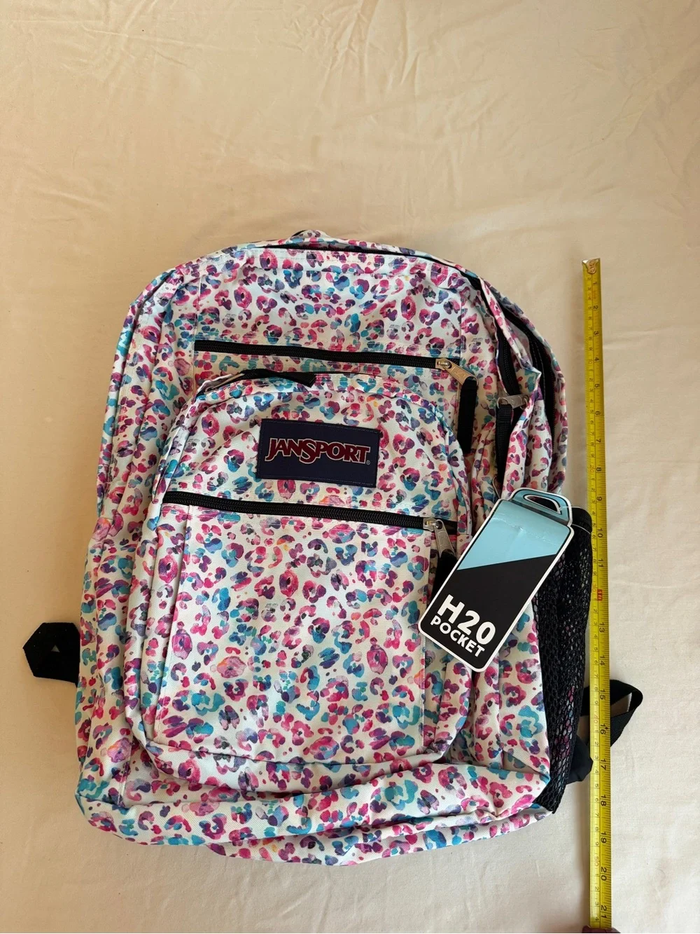 JanSport Backpack in White with Pink & Blue Leopard Print